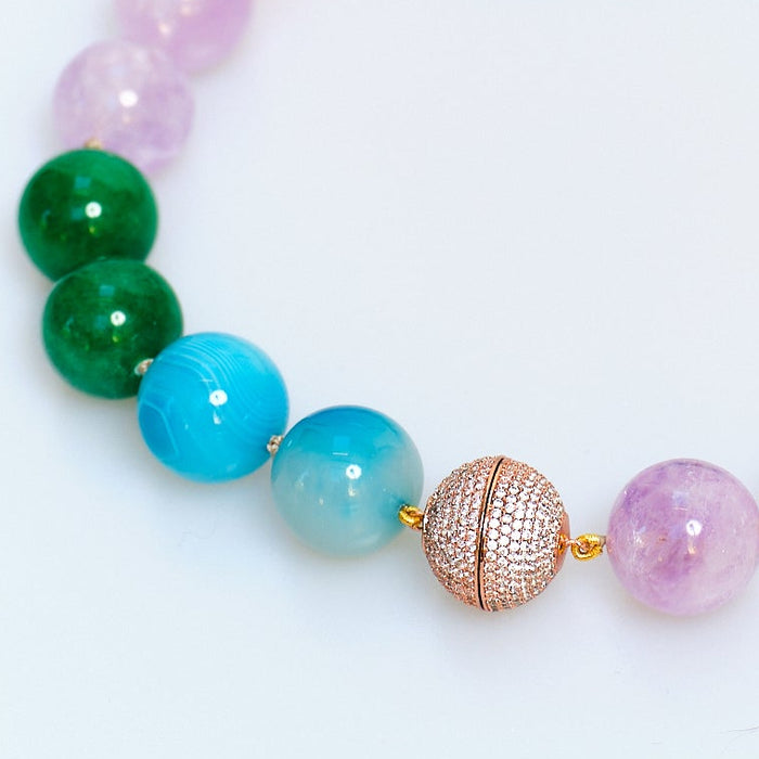 Multicolored beaded bracelet on a white background