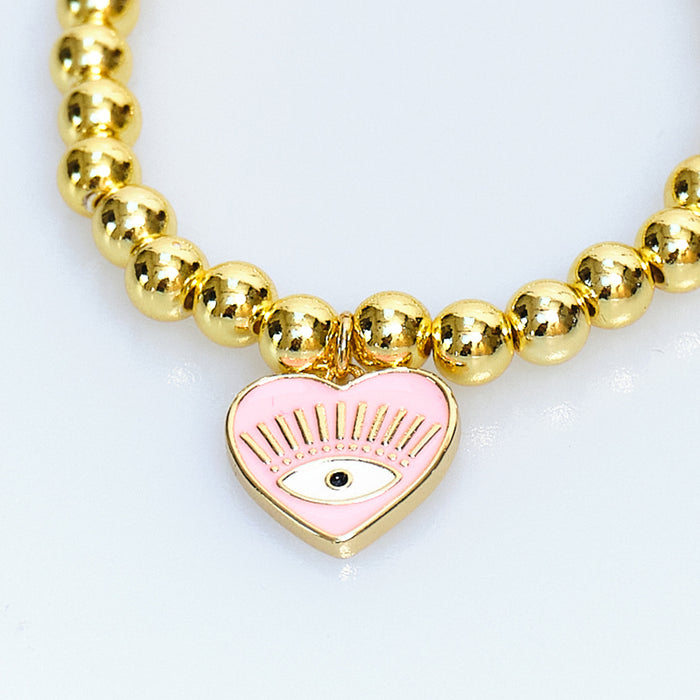Lucky Charm Gold Bead Pink Evil Eye Heart Bracelet